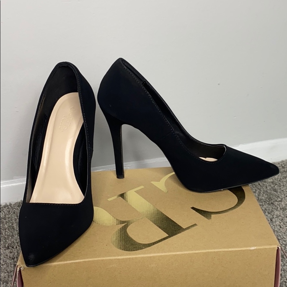 Matte black pumps